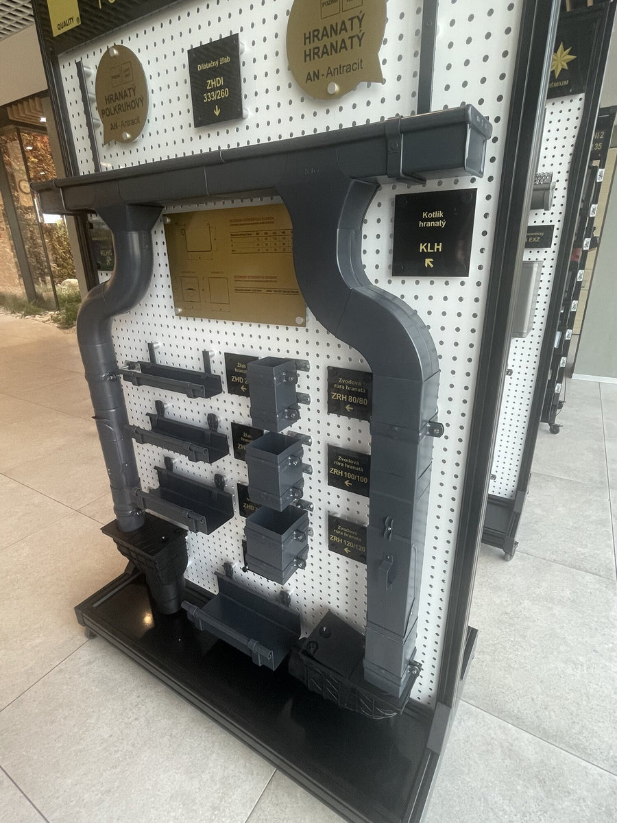 Square gutter and downpipe on display in the KJG showroom